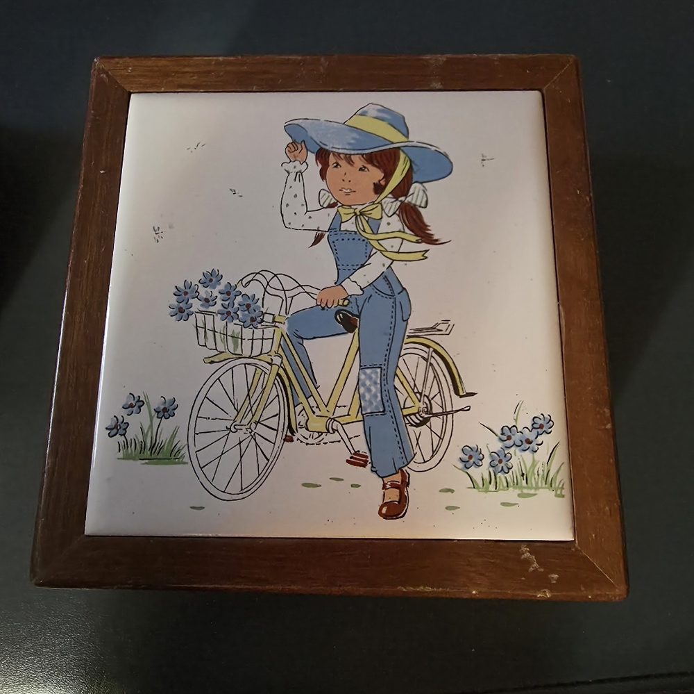 Vintage Hand painted tile-top jewelry box. A Girl Riding Her Bike, Big Hat